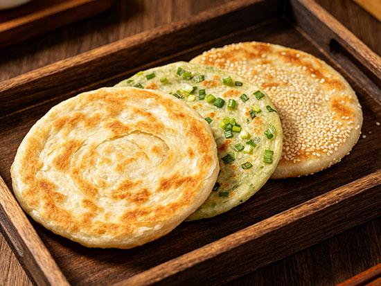 烙饼子：外酥里软，凉了也不硬